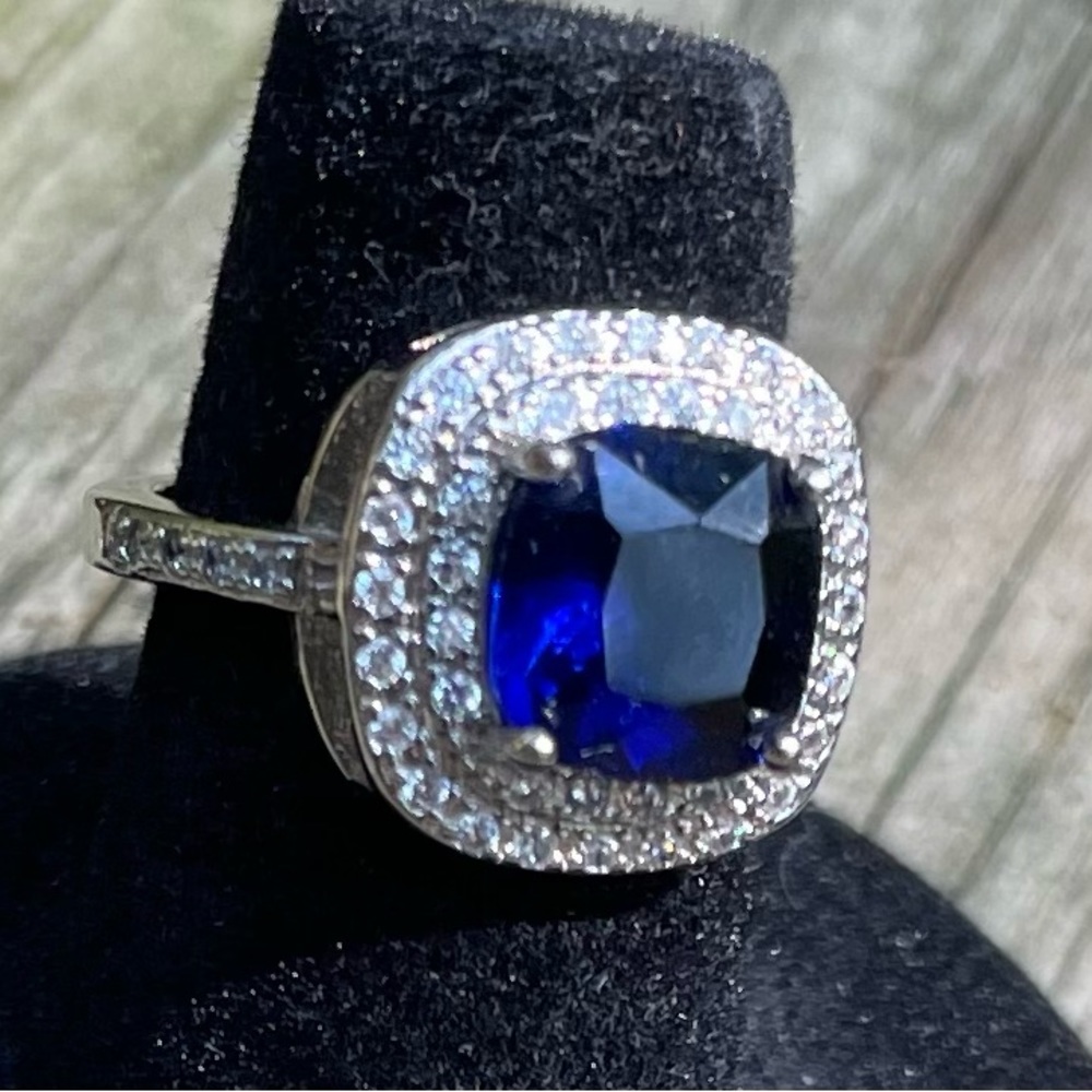 Lab created sapphire diamond accent ring.